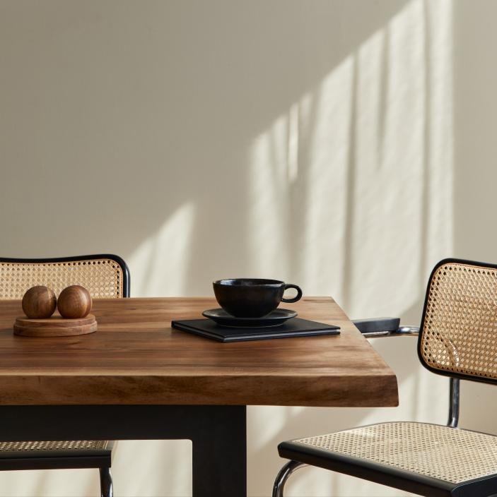 Sunlit dining and workspace setting